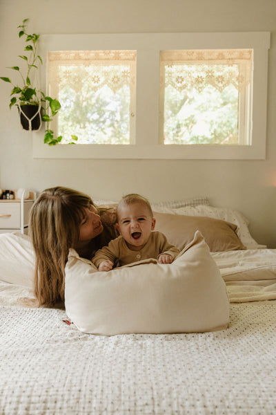 Peekaboo Pillow™ Official Site - Organic Infant Lap Pillow